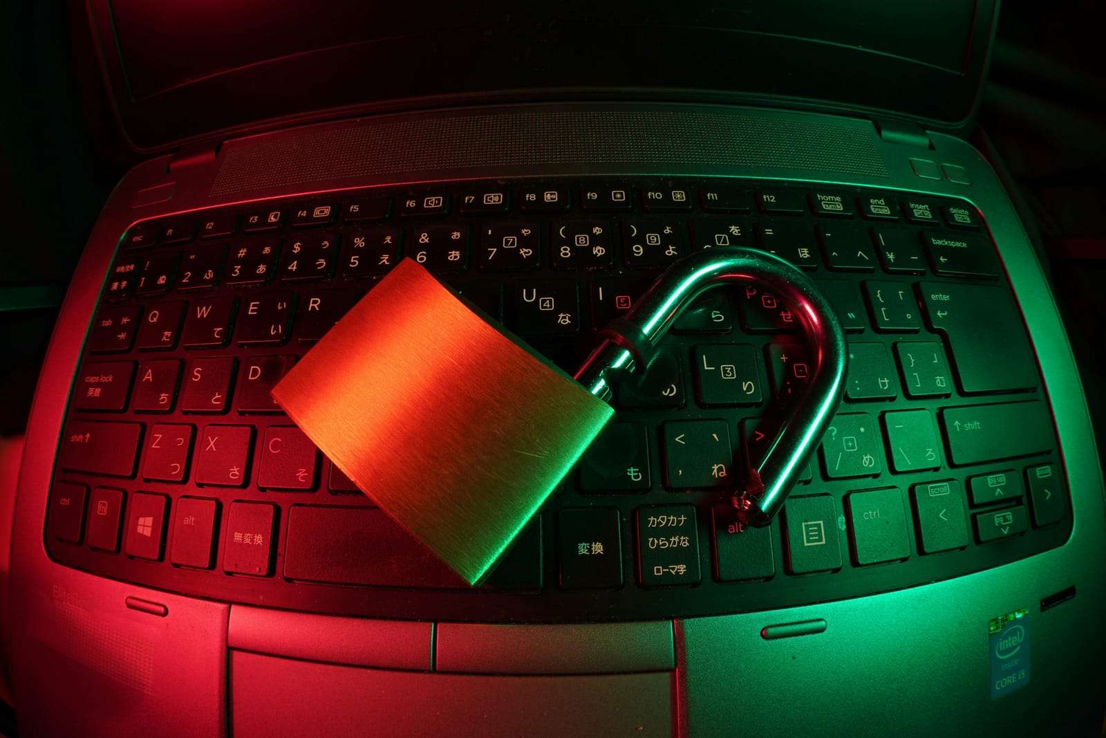 Big padlock placed on a laptop keyboard