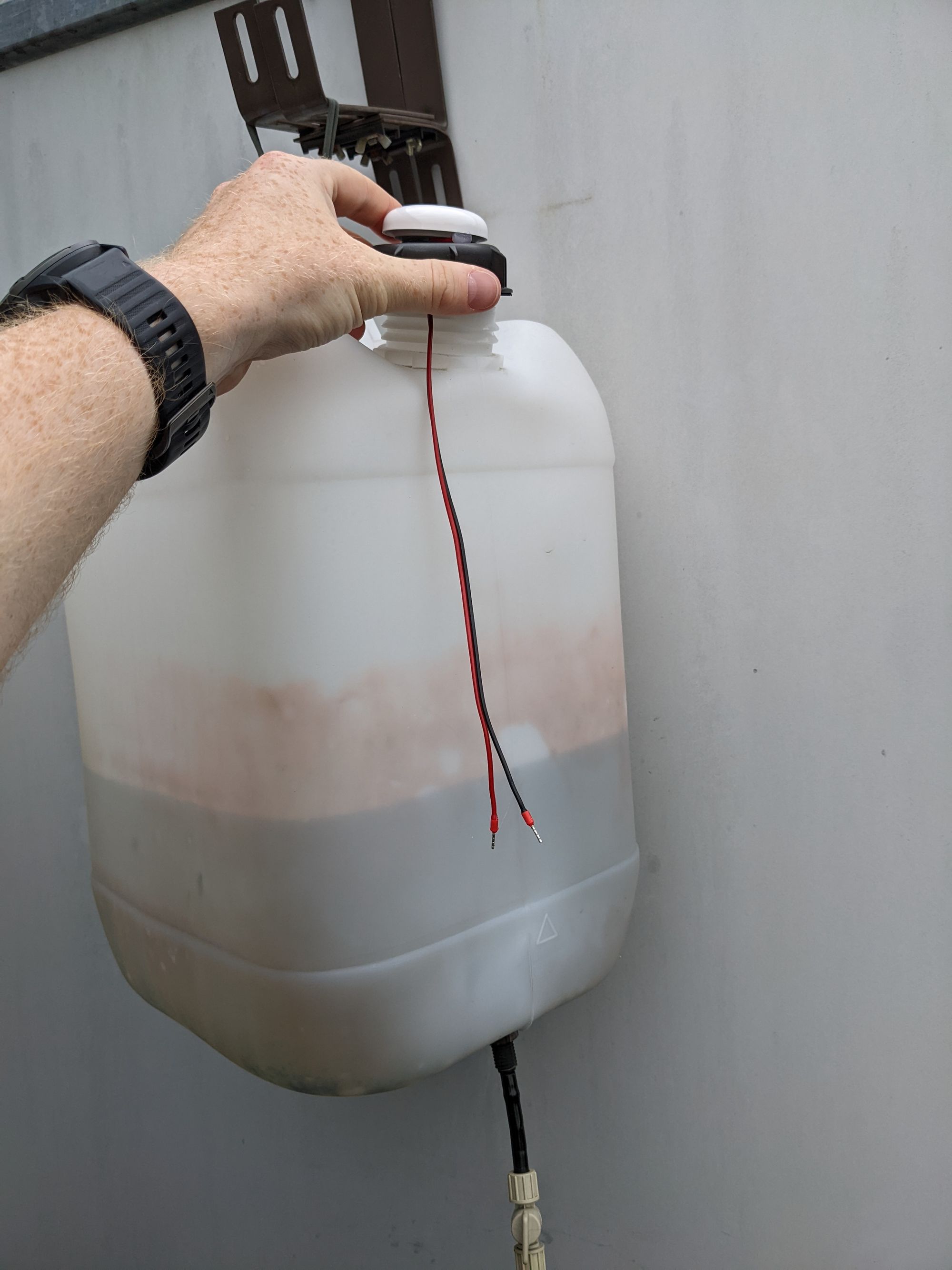 Water leak sensor in water container