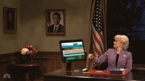 Man smashing a monitor and saying "Fixed it!"