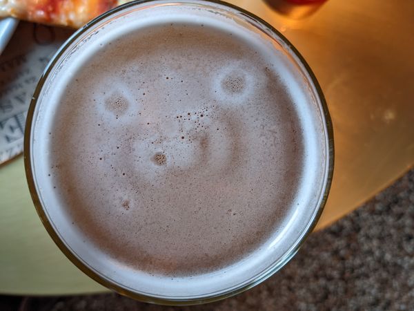 Face in a a beer