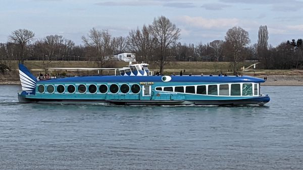 A boat which looks like a blue whale