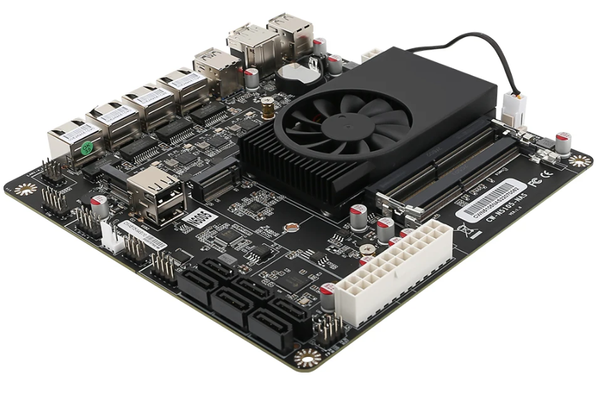 Picture show a motherboard with an integrated CPU and fan